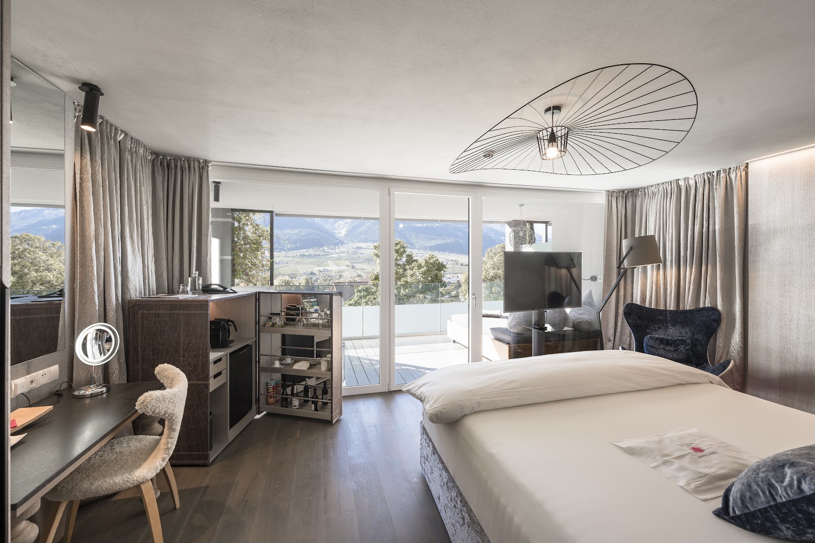 Preidlhof luxury suite balcony Alpine view