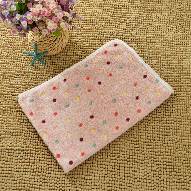 Fleece pet mat with paw and bone pattern