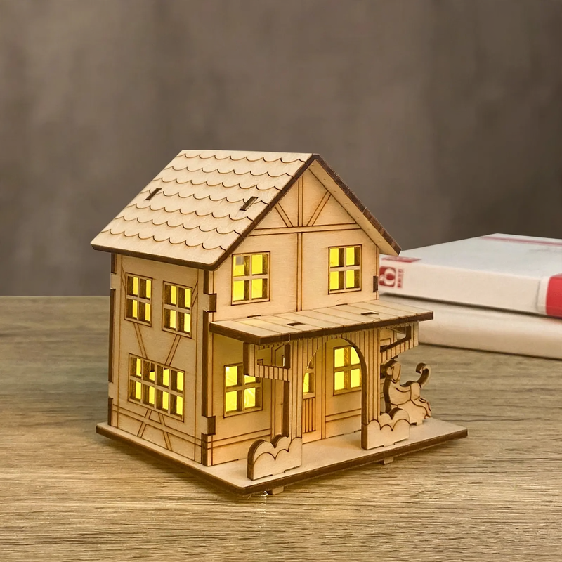 DIY Christmas house made of lime wood with lighting