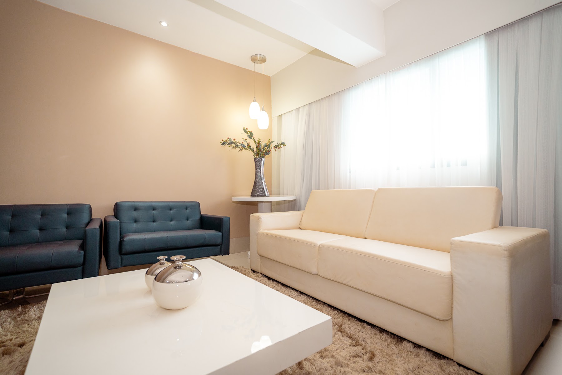 Sala de estar do Hotel Girassol Plaza