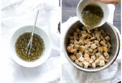 Cho bát gia vị trộn đều với dầu olive. Xếp bánh mì ra khay nướng, trộn đều với hỗn hợp dầu olive, cho khay vào lò nướng trong 35-40 phút cho đến khi vàng giòn.