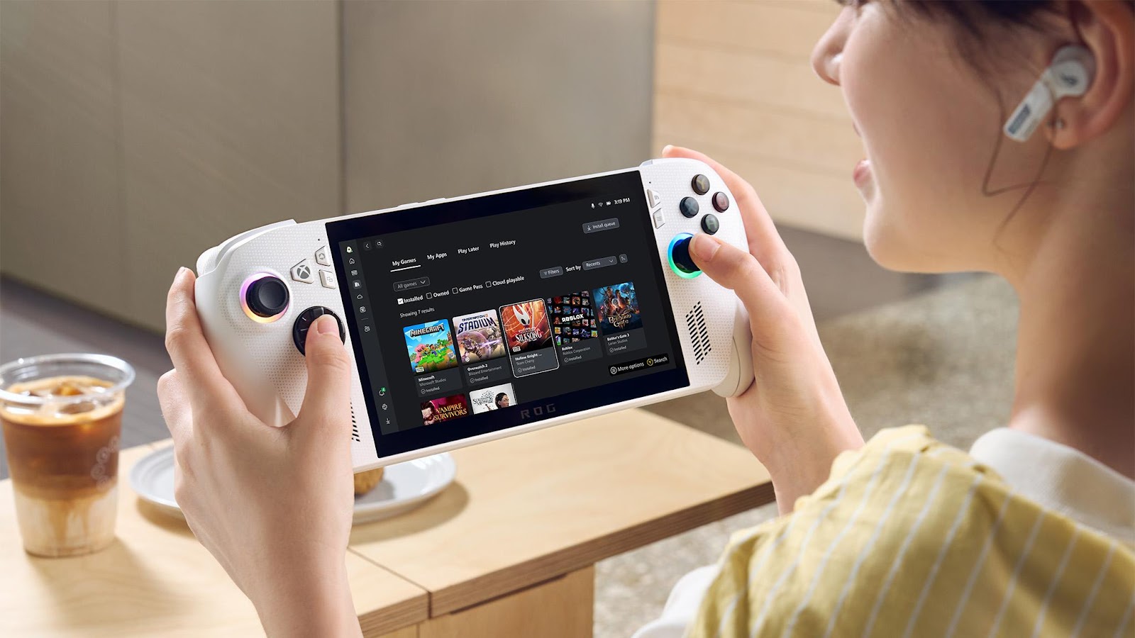 A person holding a video game controller    AI-generated content may be incorrect.