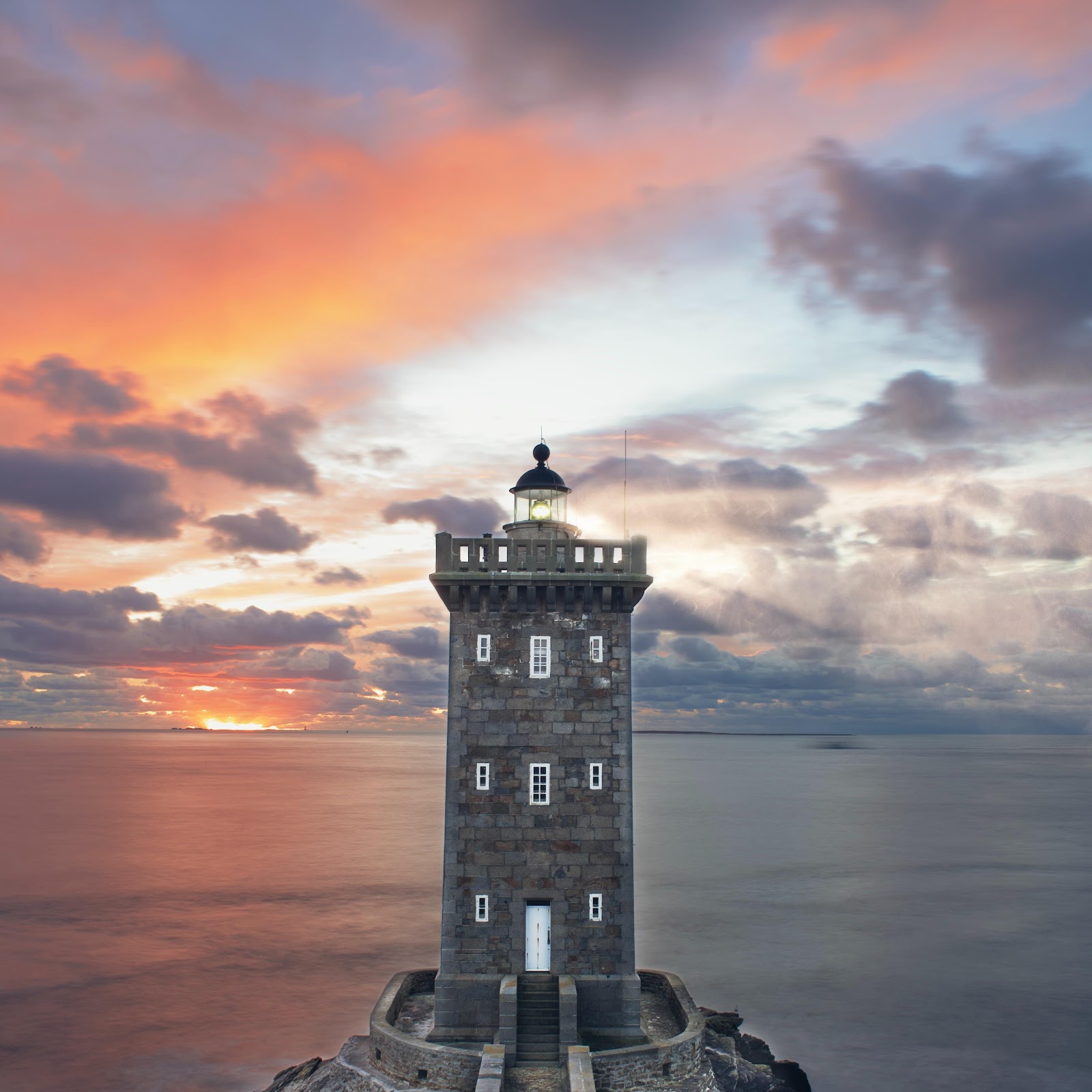 Download Kermorvan Lighthouse At Sunset 5K iPhone