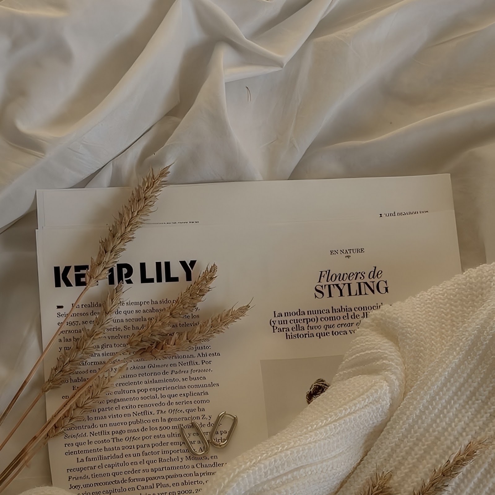 Download White Sweater And Magazine Flatlay Full HD iPhone
