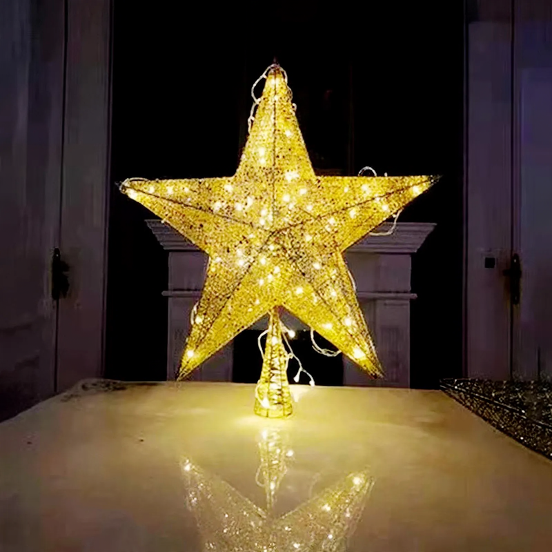 Christmas tree star made of metal, with glitter