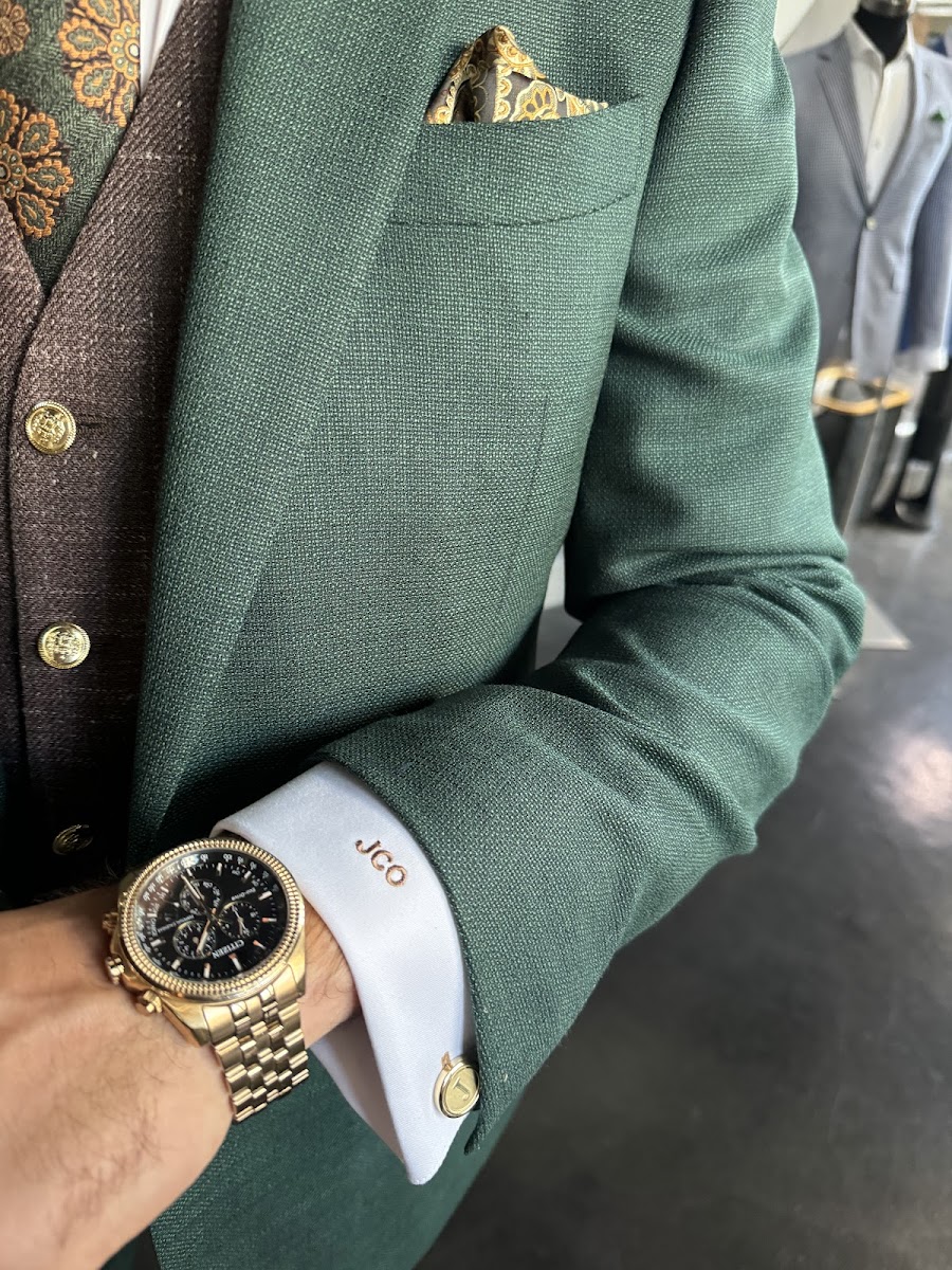 Bespoke grey tuxedo jacket with hand-stitched peak lapel crafted by Bespoke By CB