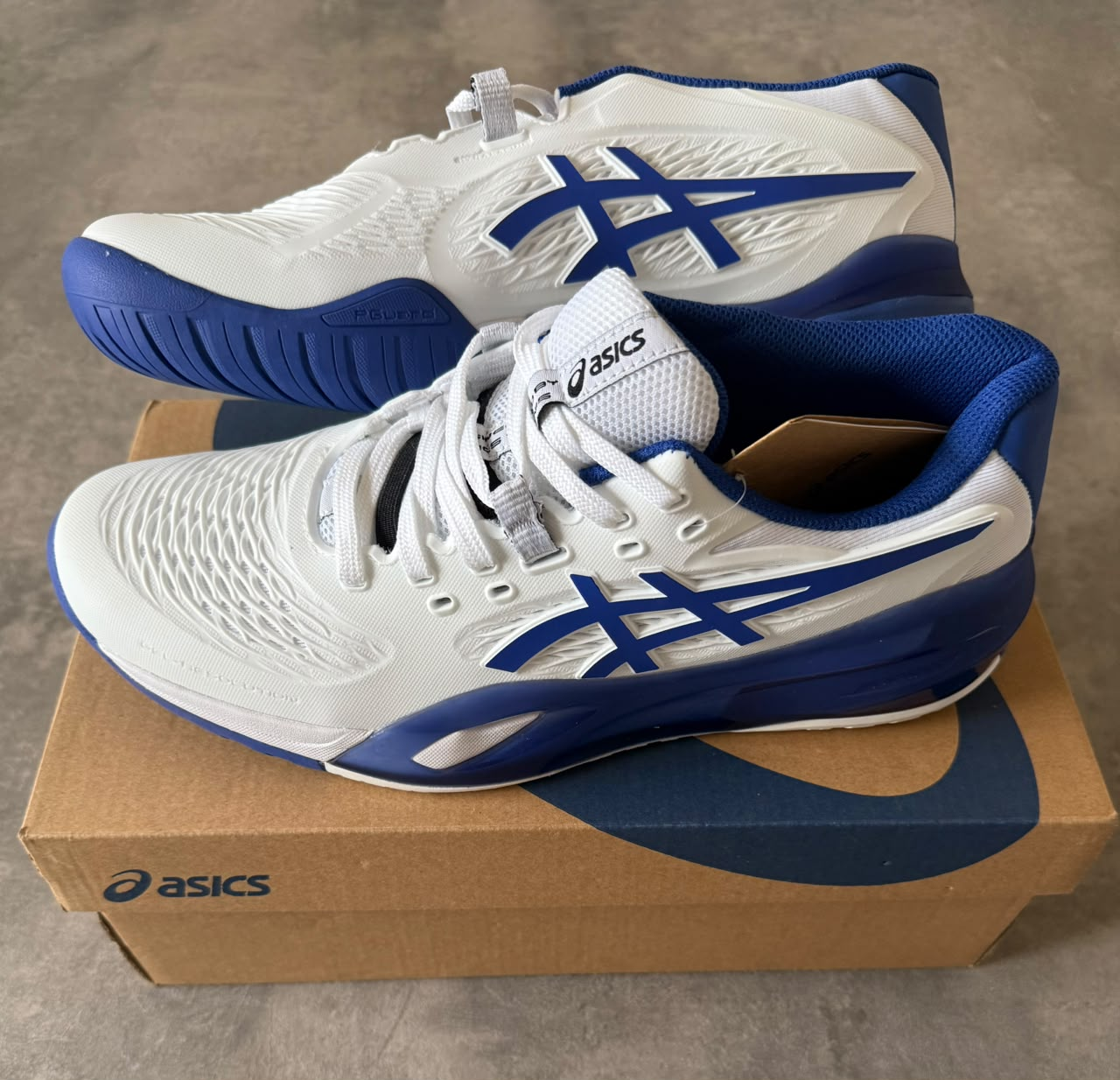 ASICS RESOLUTION X BLANCA Y AZUL