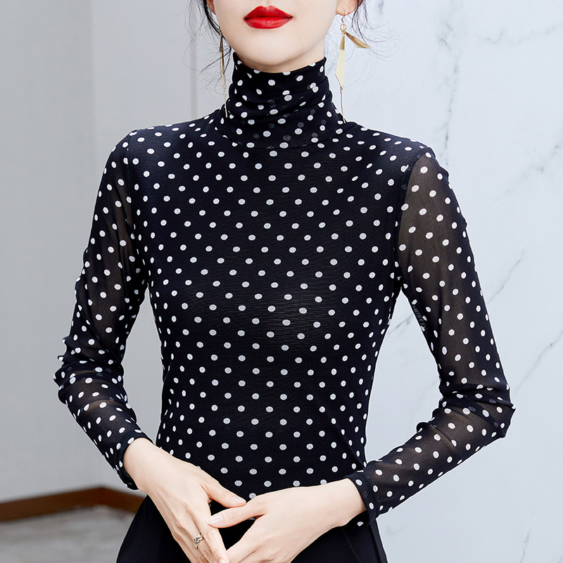 Women’s top with stand-up collar and polka dot pattern