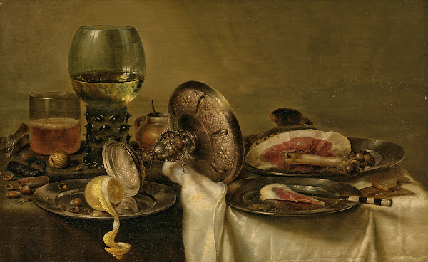 A partially draped table with an overturned tazza roemer and glass of beer with