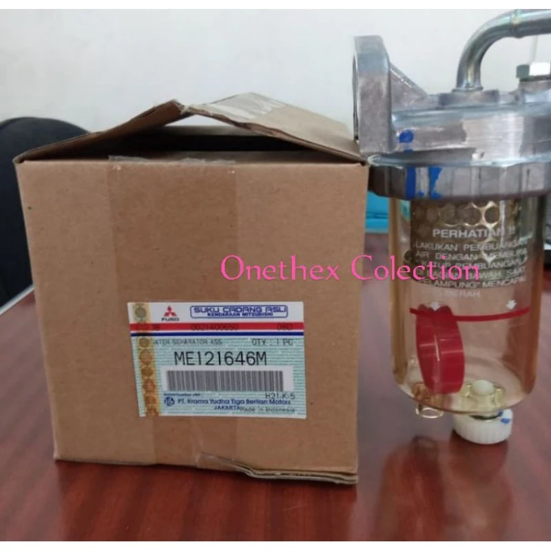 Filter Solar Bawah Komplit Canter Original Mitsubishi ME121646M untuk Kinerja Optimal