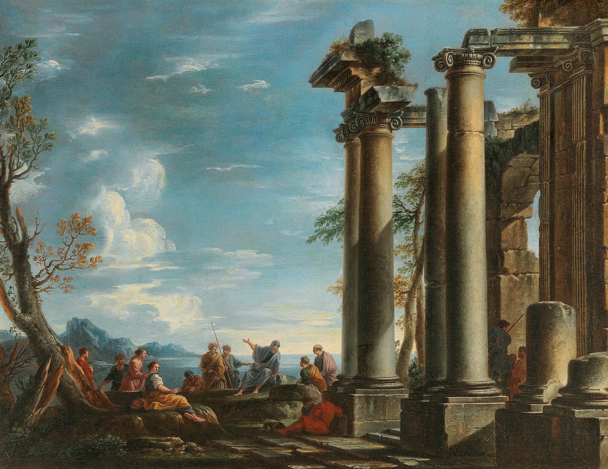 A coastal landscape with figures by a classical ruin