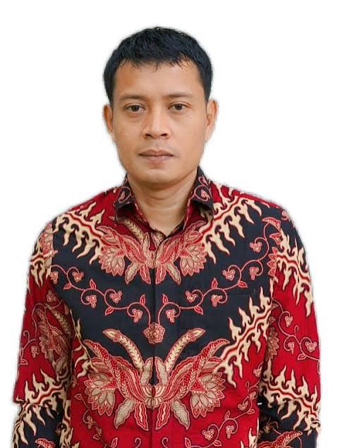 Dr. Zulfadli, M.Si