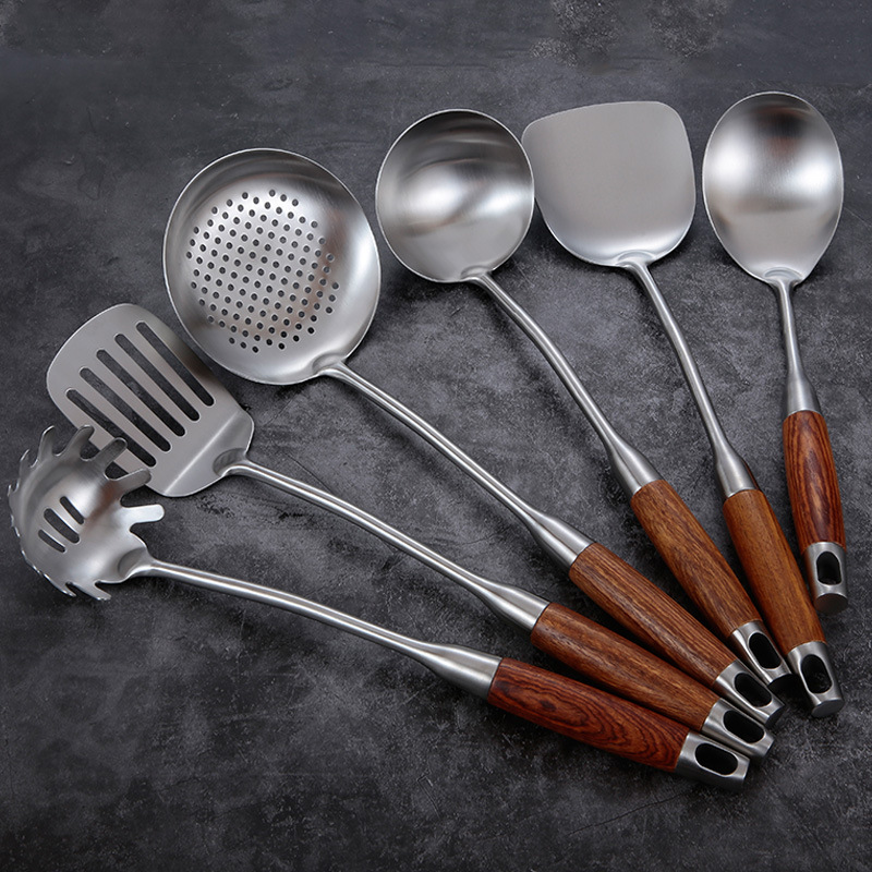 Stainless steel kitchen cutlery set with wooden handles