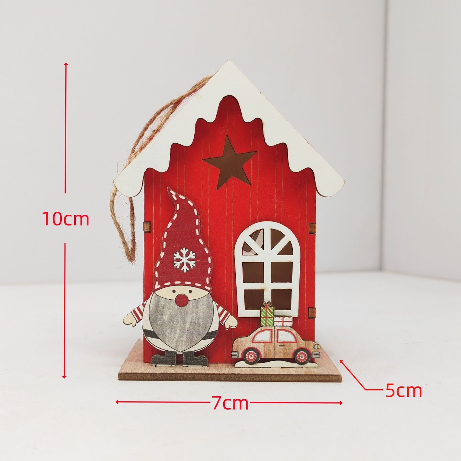 Illuminated wooden house for Christmas decoration