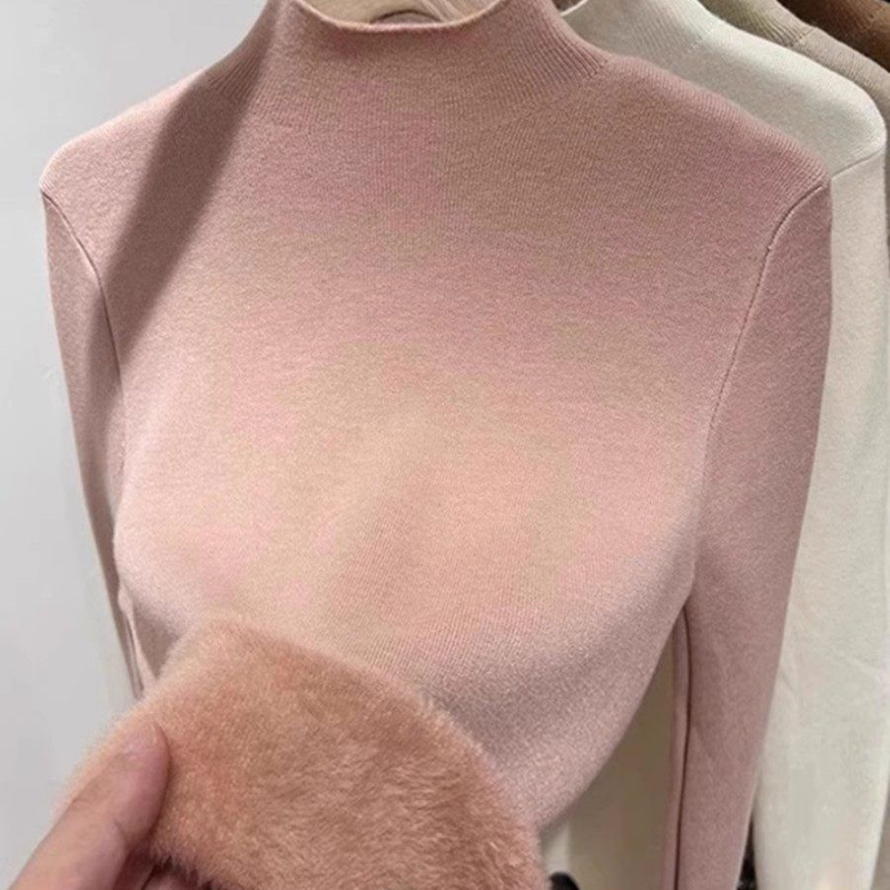 Women's knitted sweater with standing collar and fleece lining