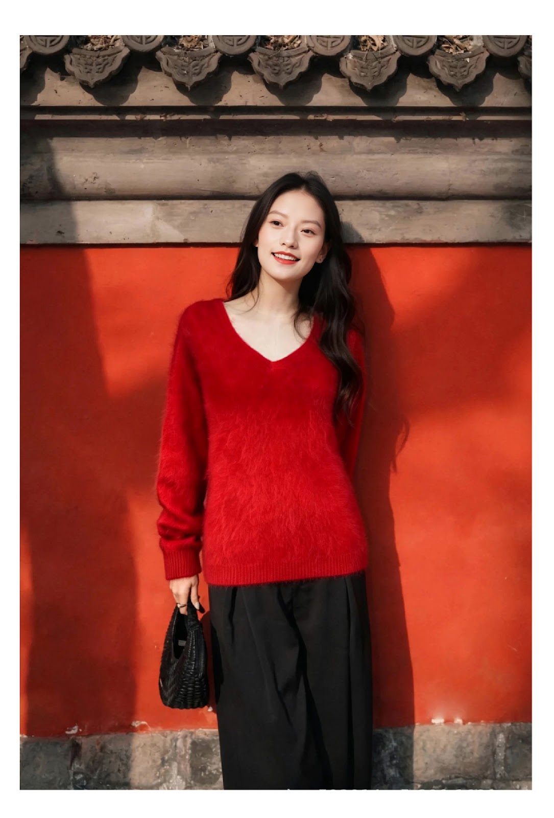 Women's knitted sweater made from a wool blend with a V-neck