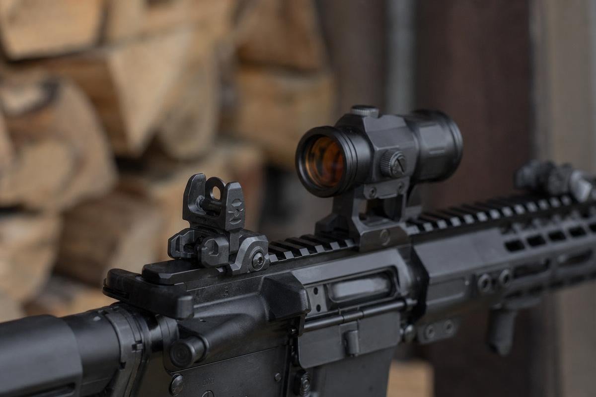 AR-15 backup sights mounted on flat-top upper with red dot optic