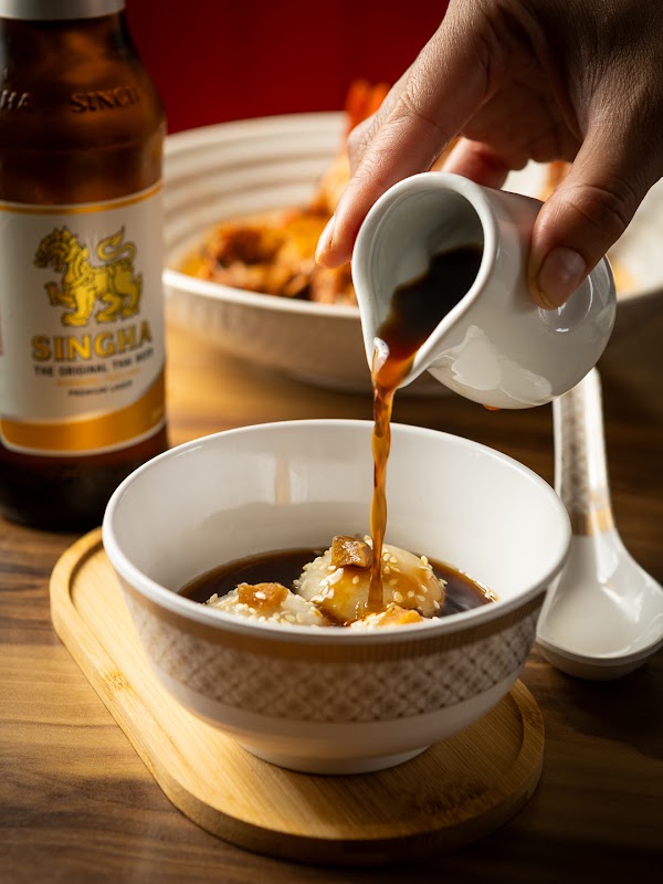 Black sesame mochi ball with house ginger syrup