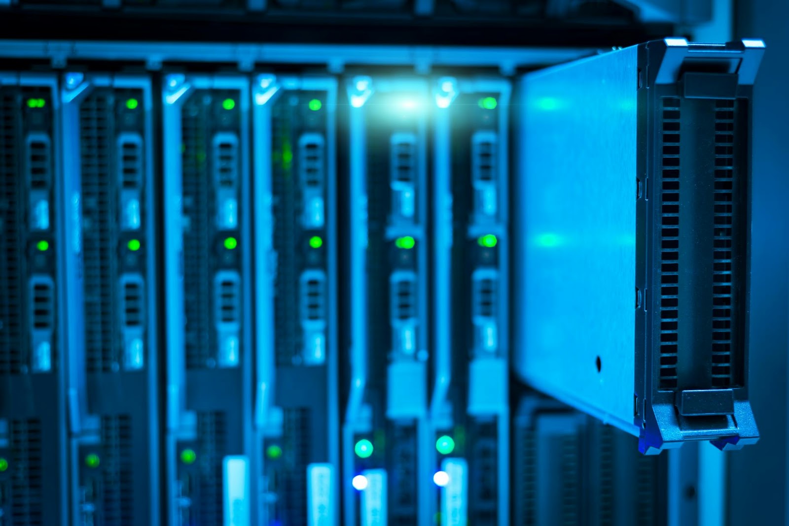 Rows of glowing server racks in a data center, illustrating the high compute Generative AI Costs.
