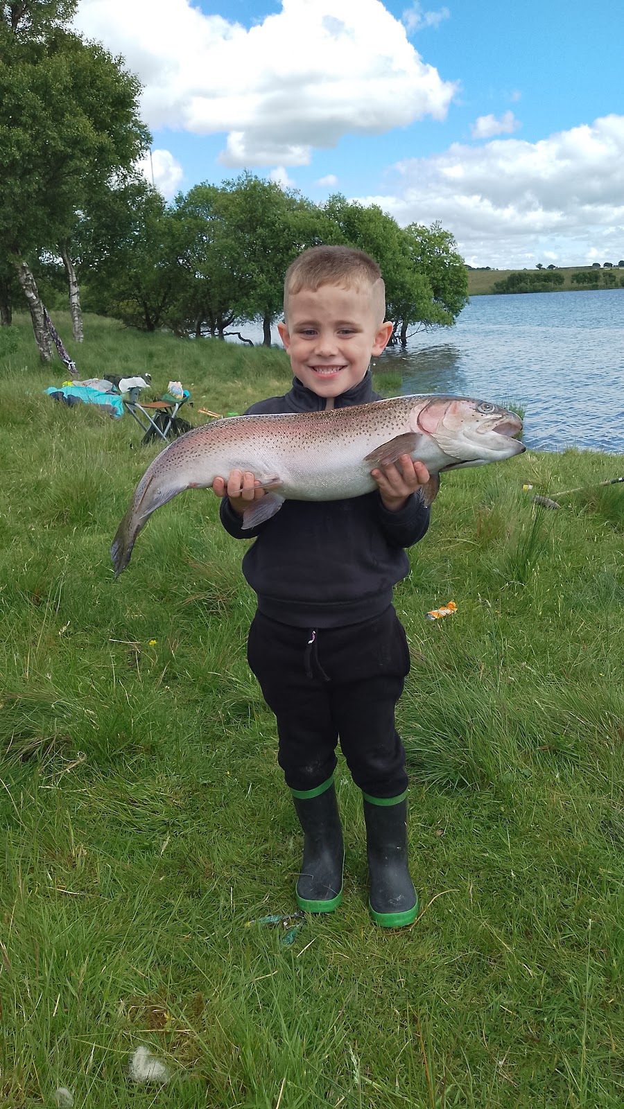Junior Laird with a Rainbow Trout caught at Roughrigg Reservoir