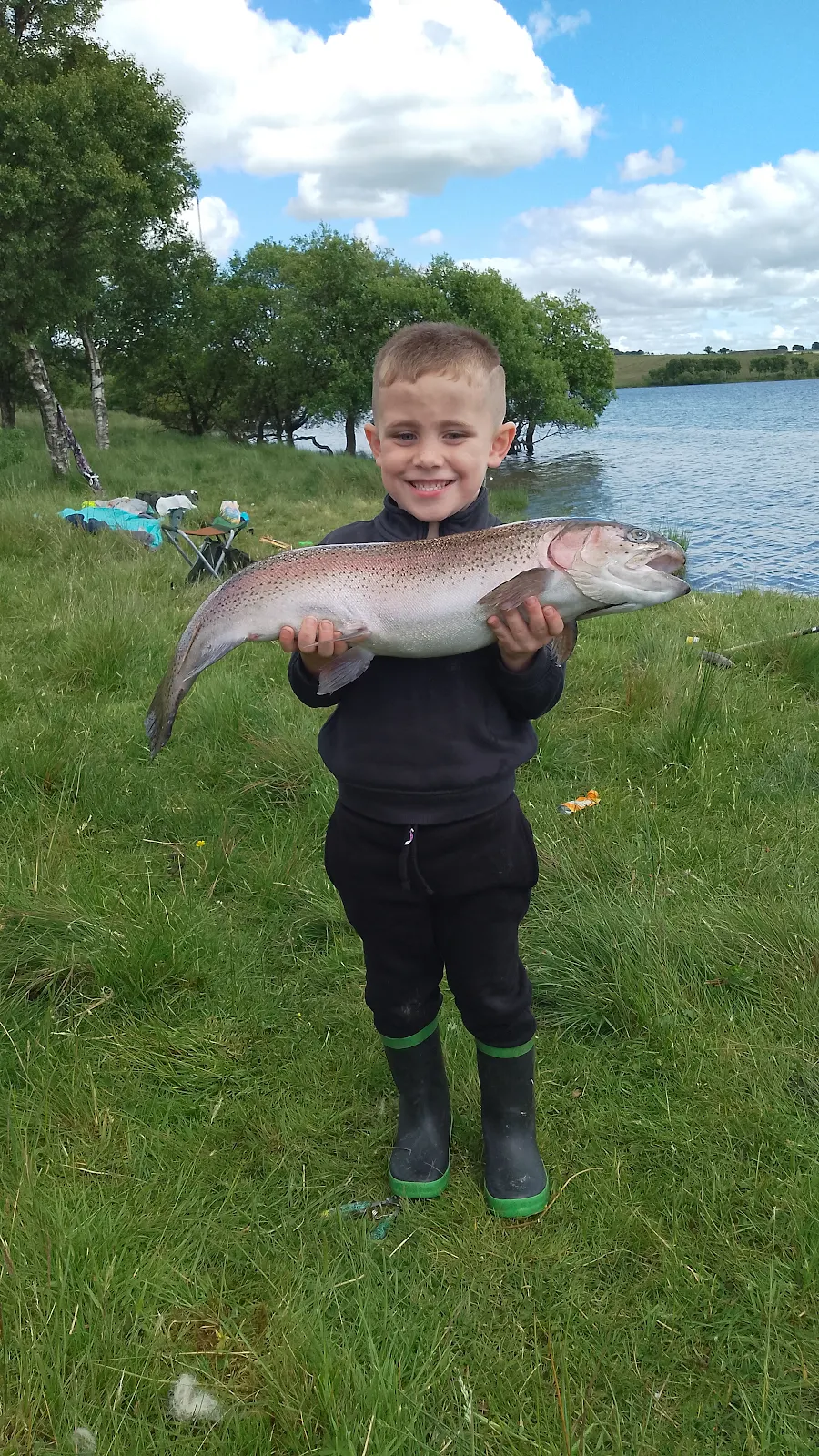 Junior Laird with a Rainbow Trout caught at Roughrigg Reservoir