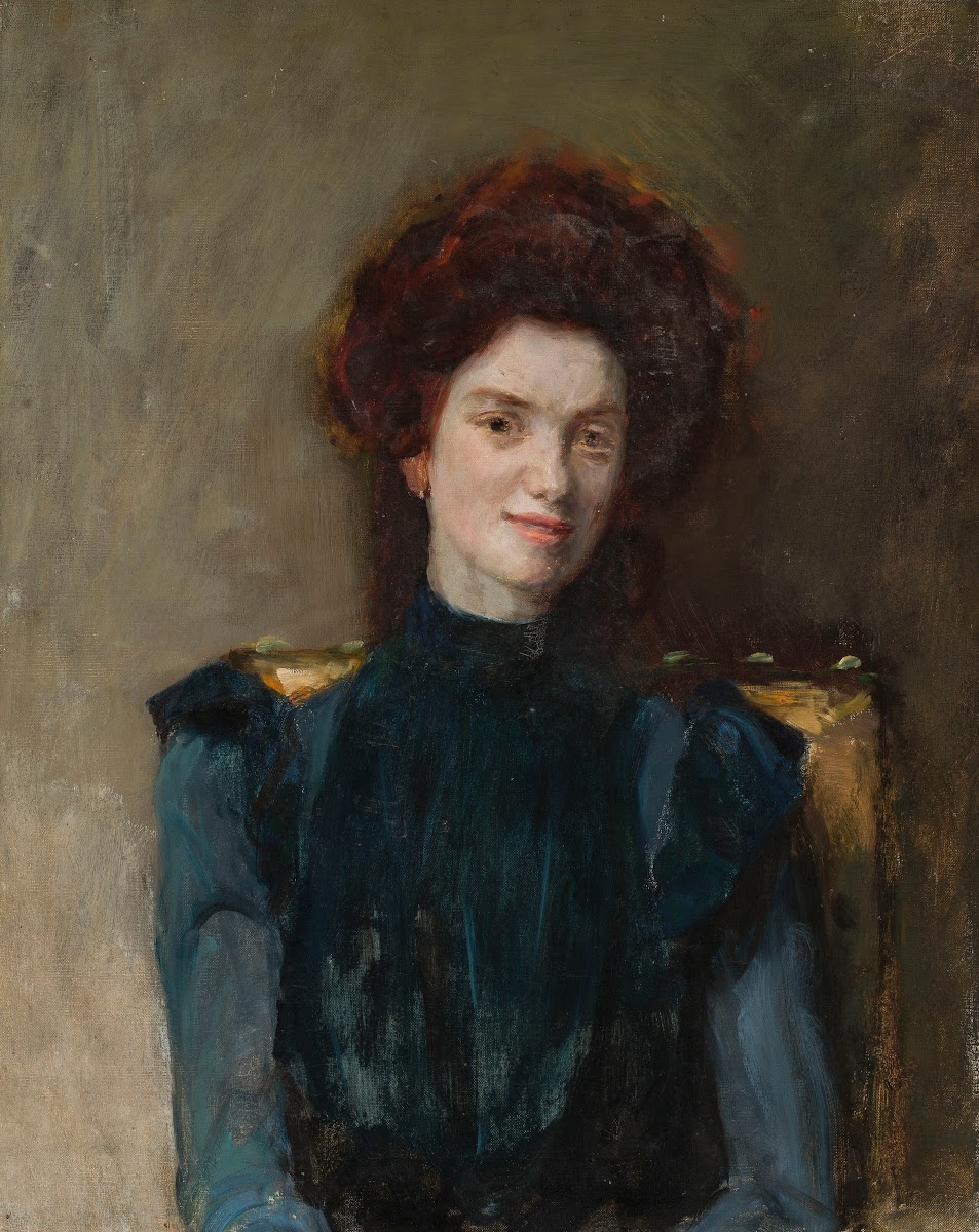 Portrait of red haired woman