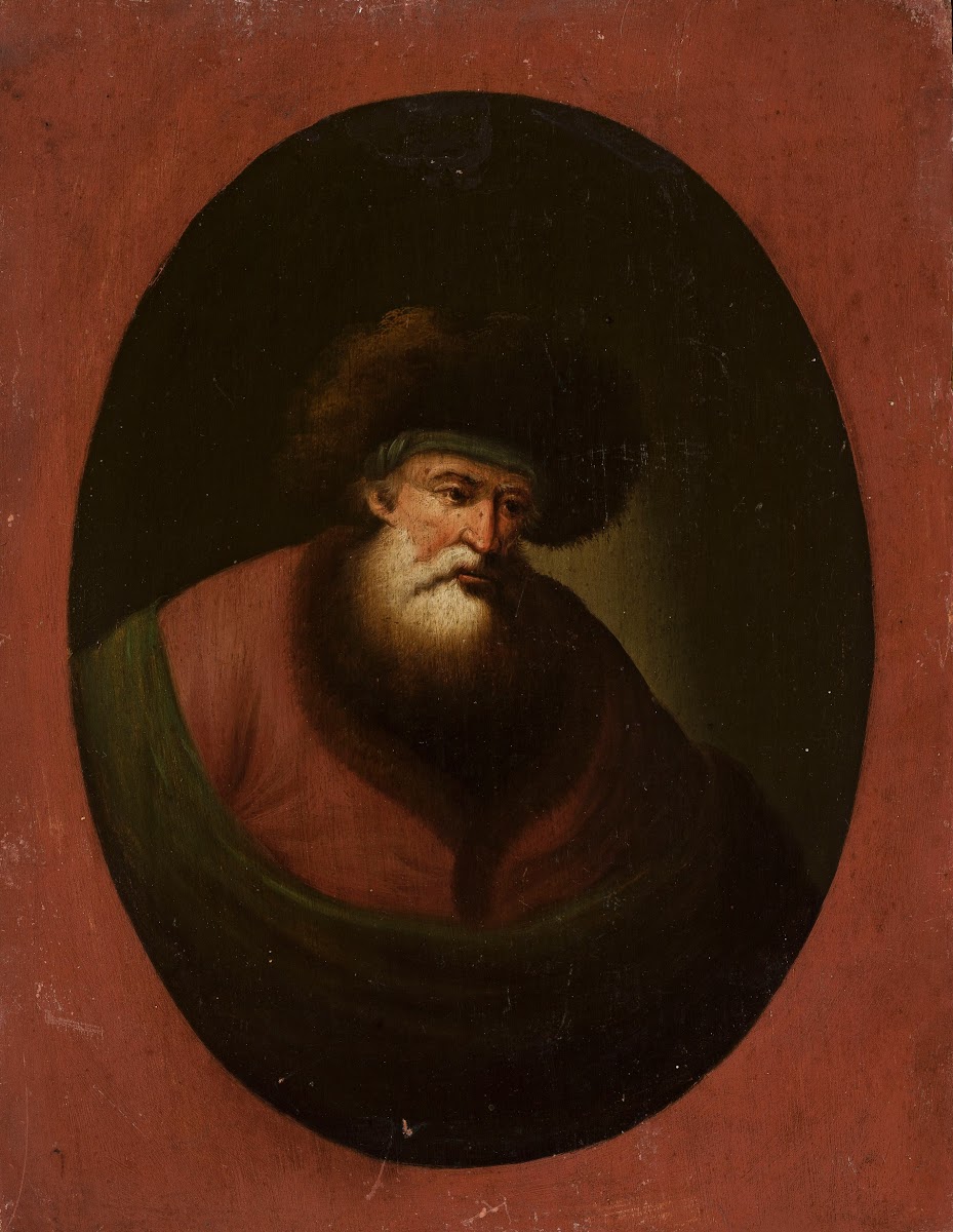 Old man with green fabric