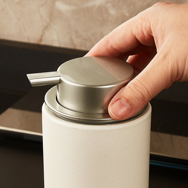 Ceramic soap dispenser with pump