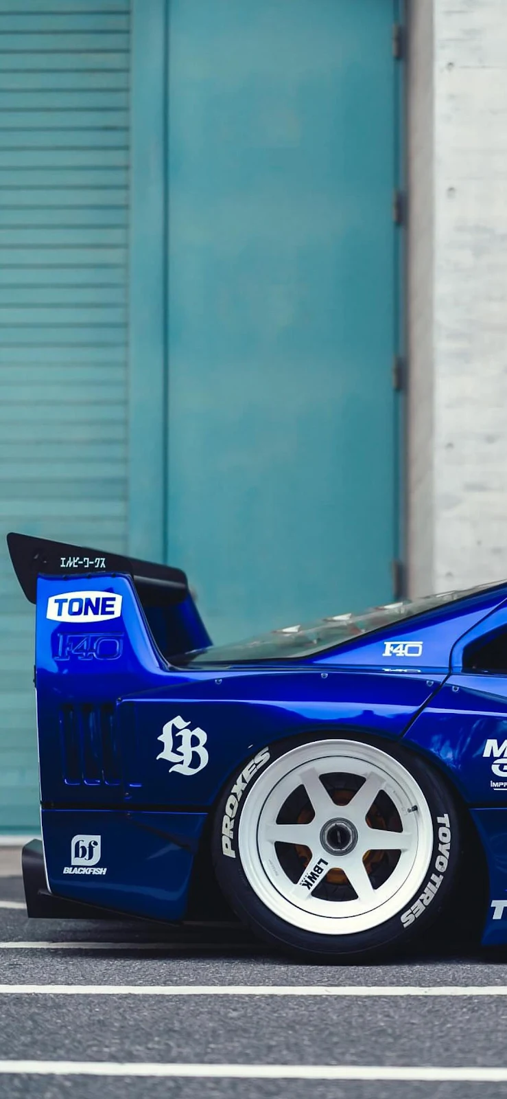 Modified Blue Ferrari F40 Rear View - Automotive Photography Full HD iPhone Wallpaper (1090x2360)