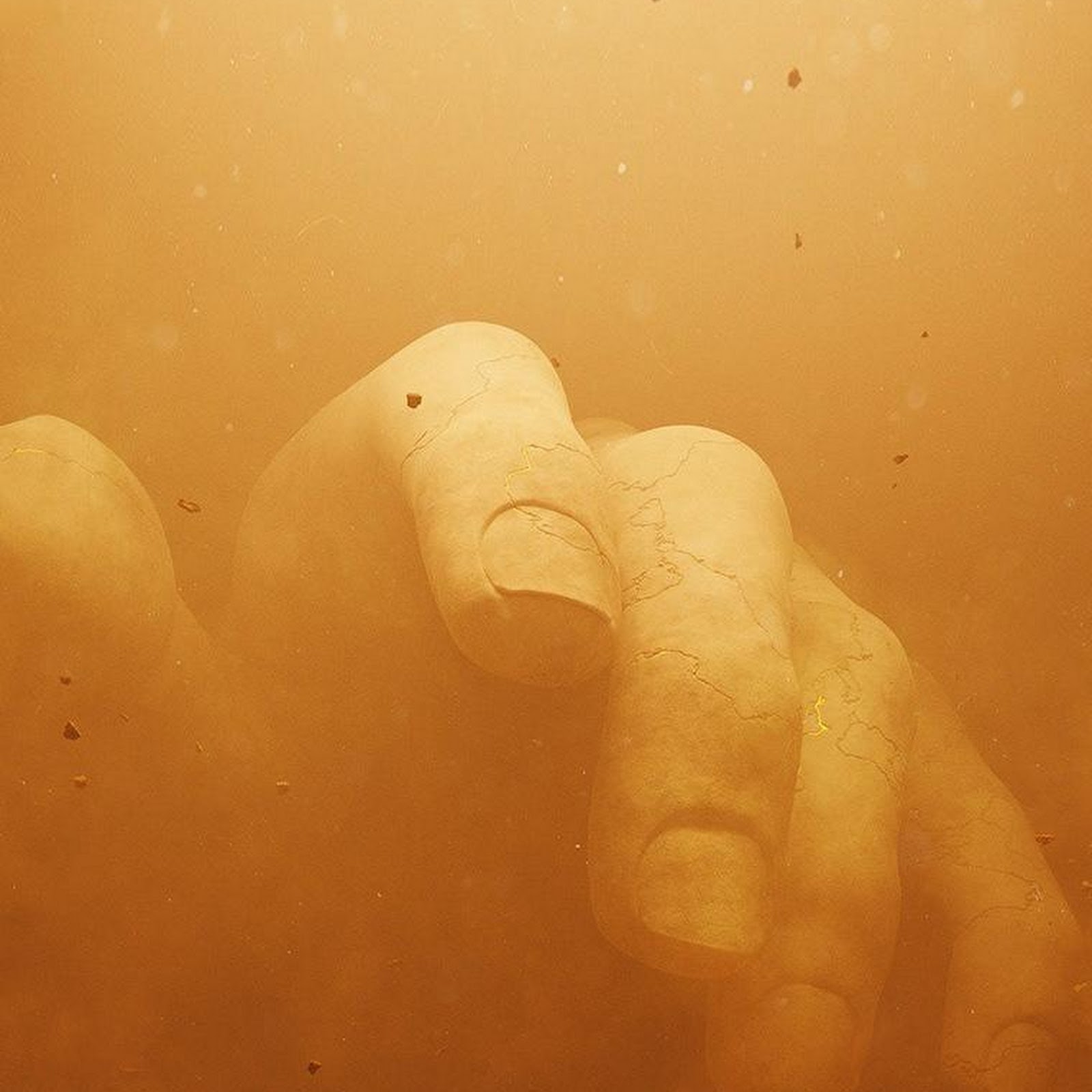 Download Giant Stone Hand In Dust iPhone