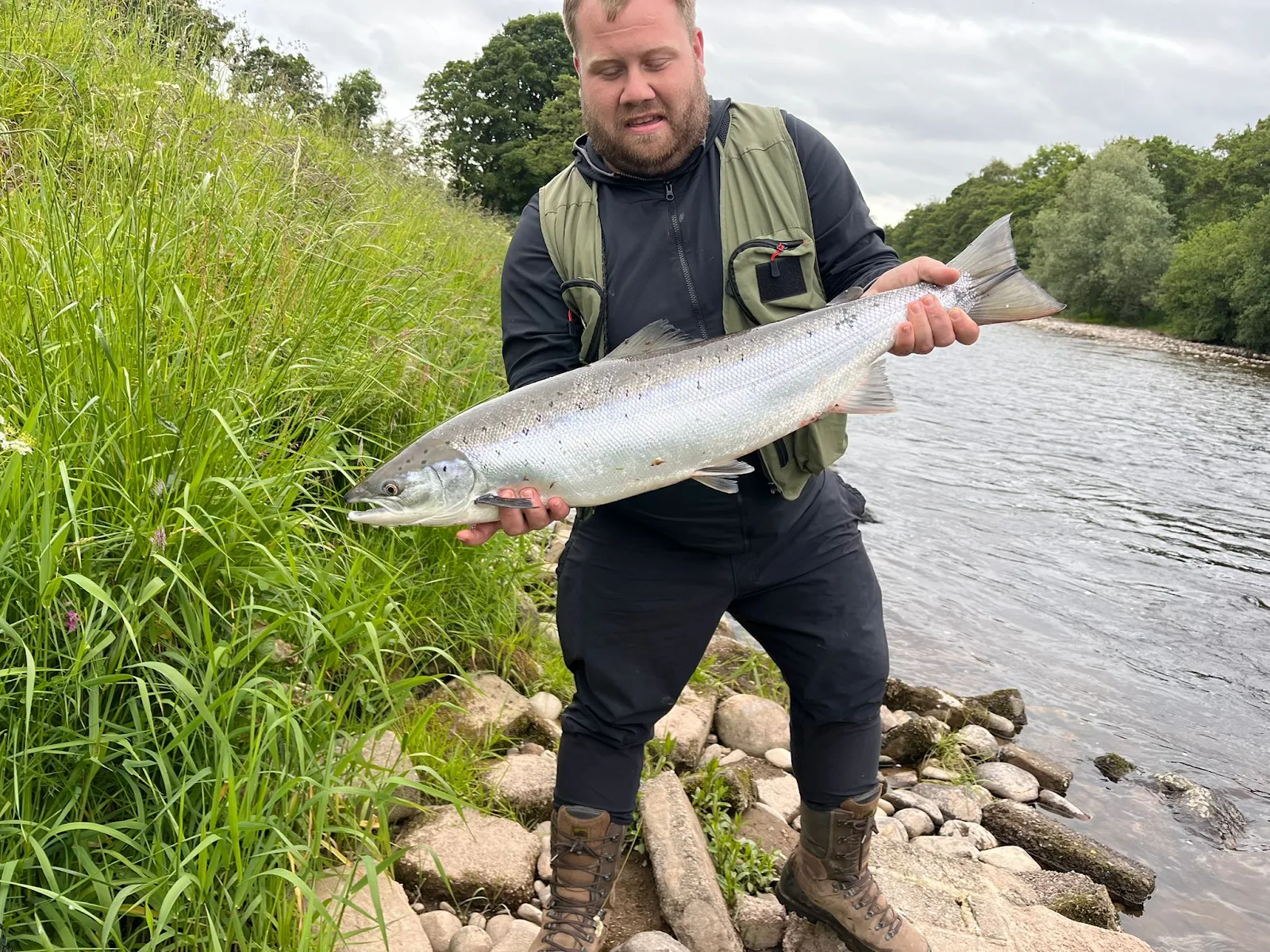 Gerard Davenport with a Salmon caught on a Black and Copper Flying C on the North Esk