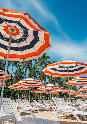 White Chairs Striped Umbrellas
