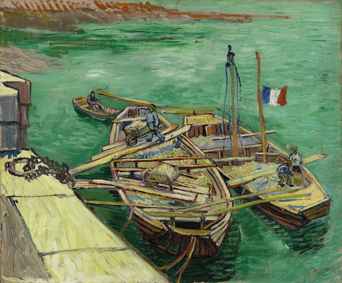 Quay with men unloading sand barges 1888