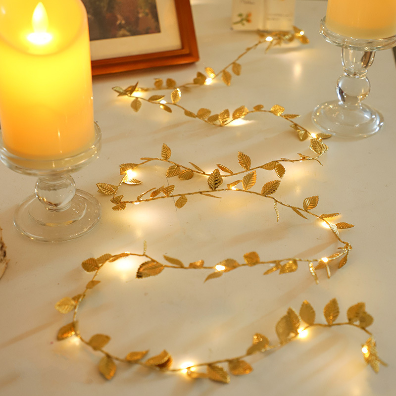 LED string lights with artificial plant vines
