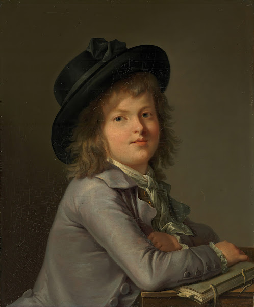Portrait of a boy in a black hat leaning on a portfolio