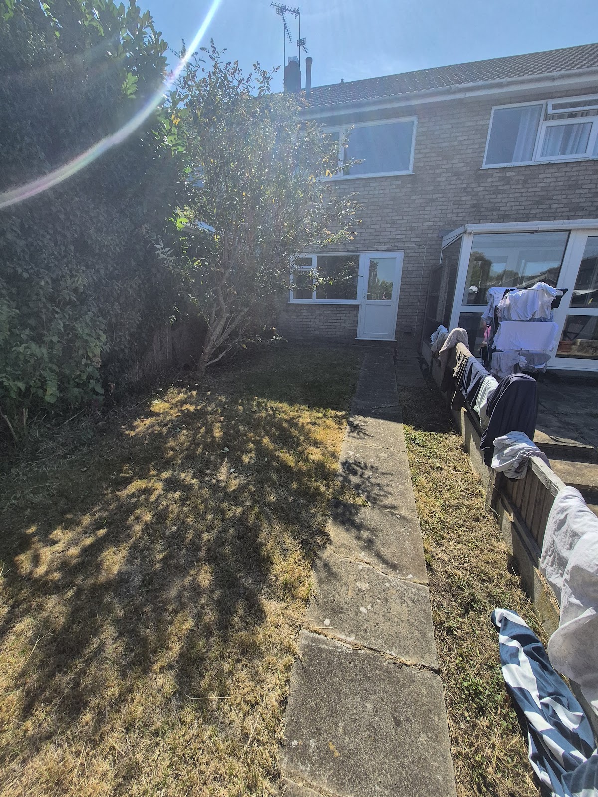 Overgrown garden cleared and maintained by LWR Group gardening contractor in Lincolnshire — hedge trimming and lawn care