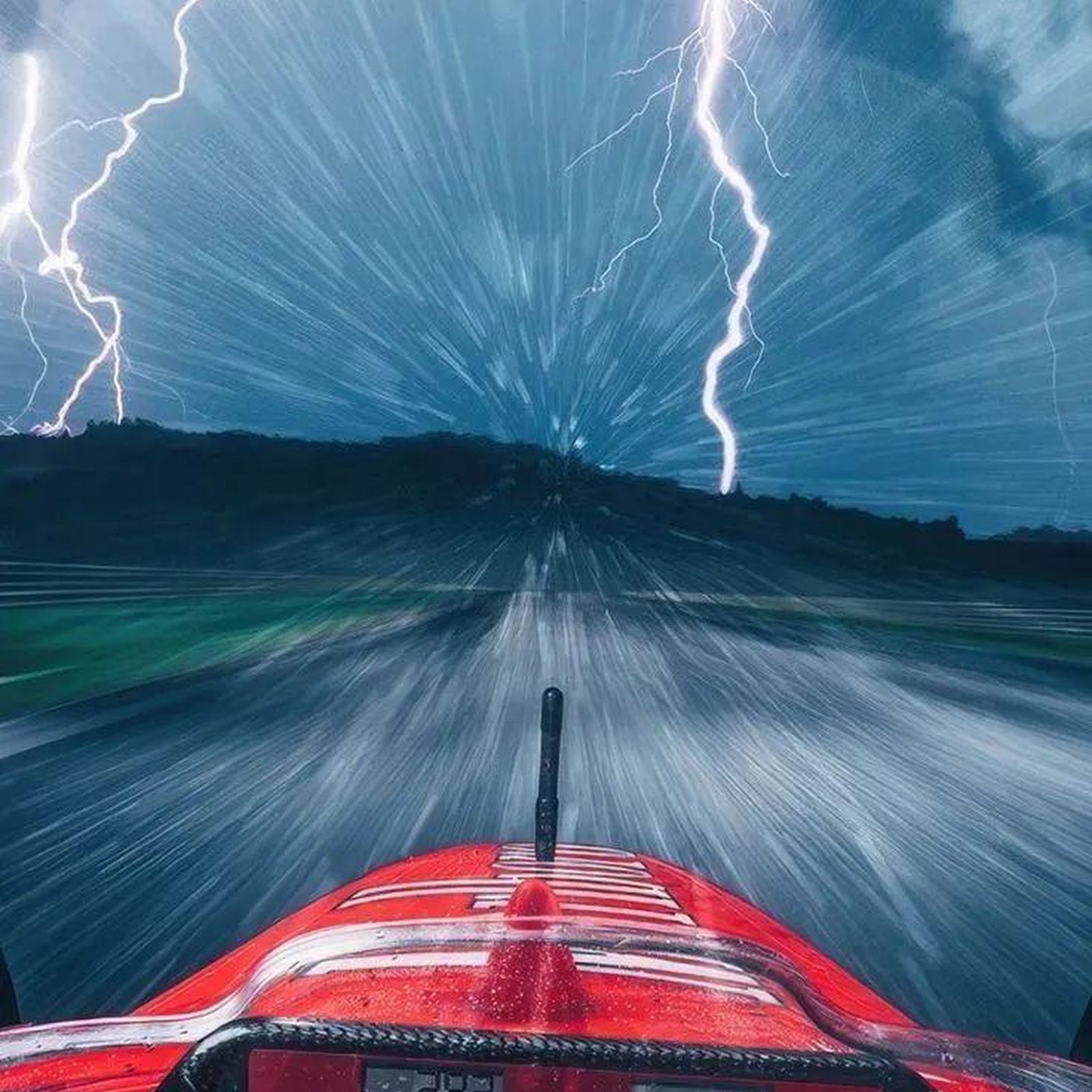 Download Ferrari F1 Car In Lightning Storm iPhone