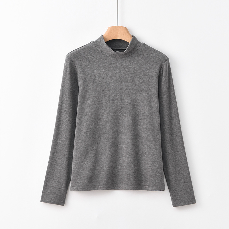 Warm knitted sweater with high collar