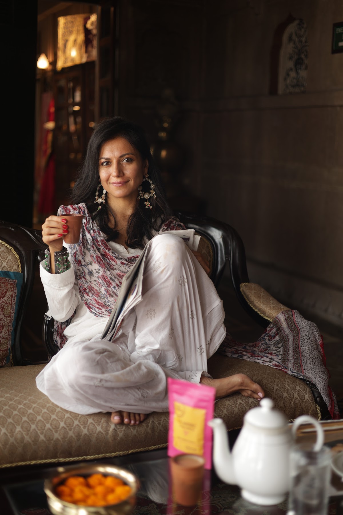 Mira with a cup of chai