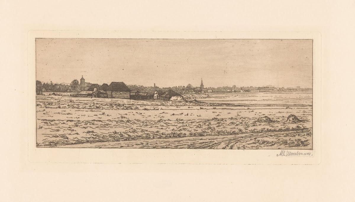 Farm with barns in a flat landscape