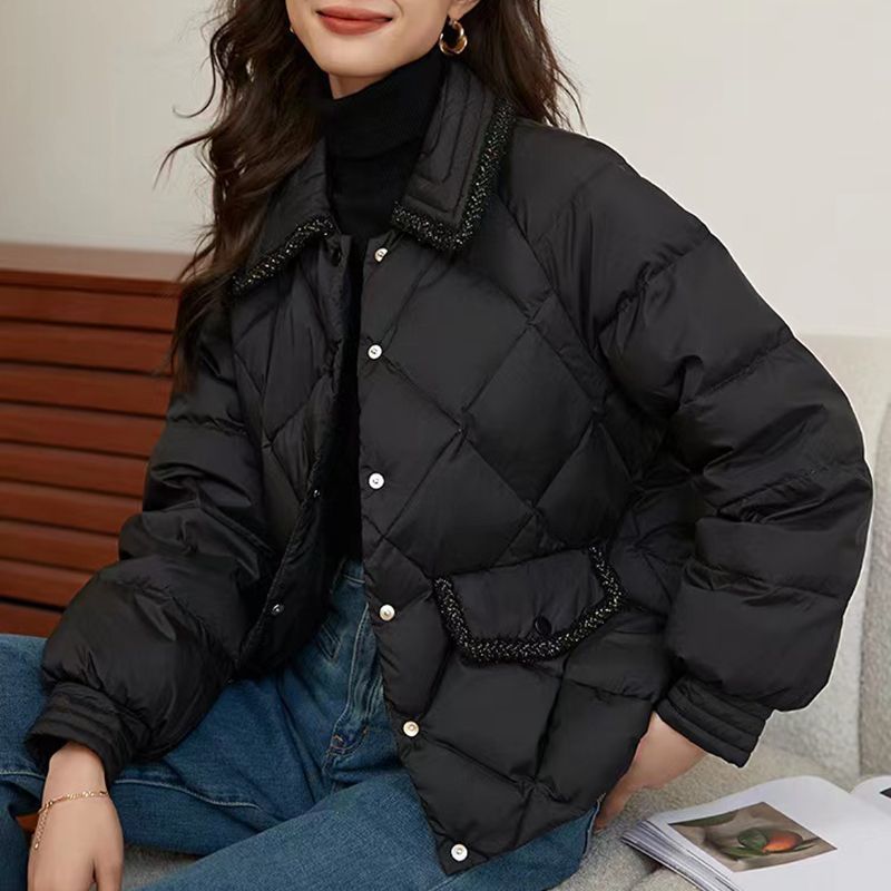 Short women's quilted jacket in a diamond design