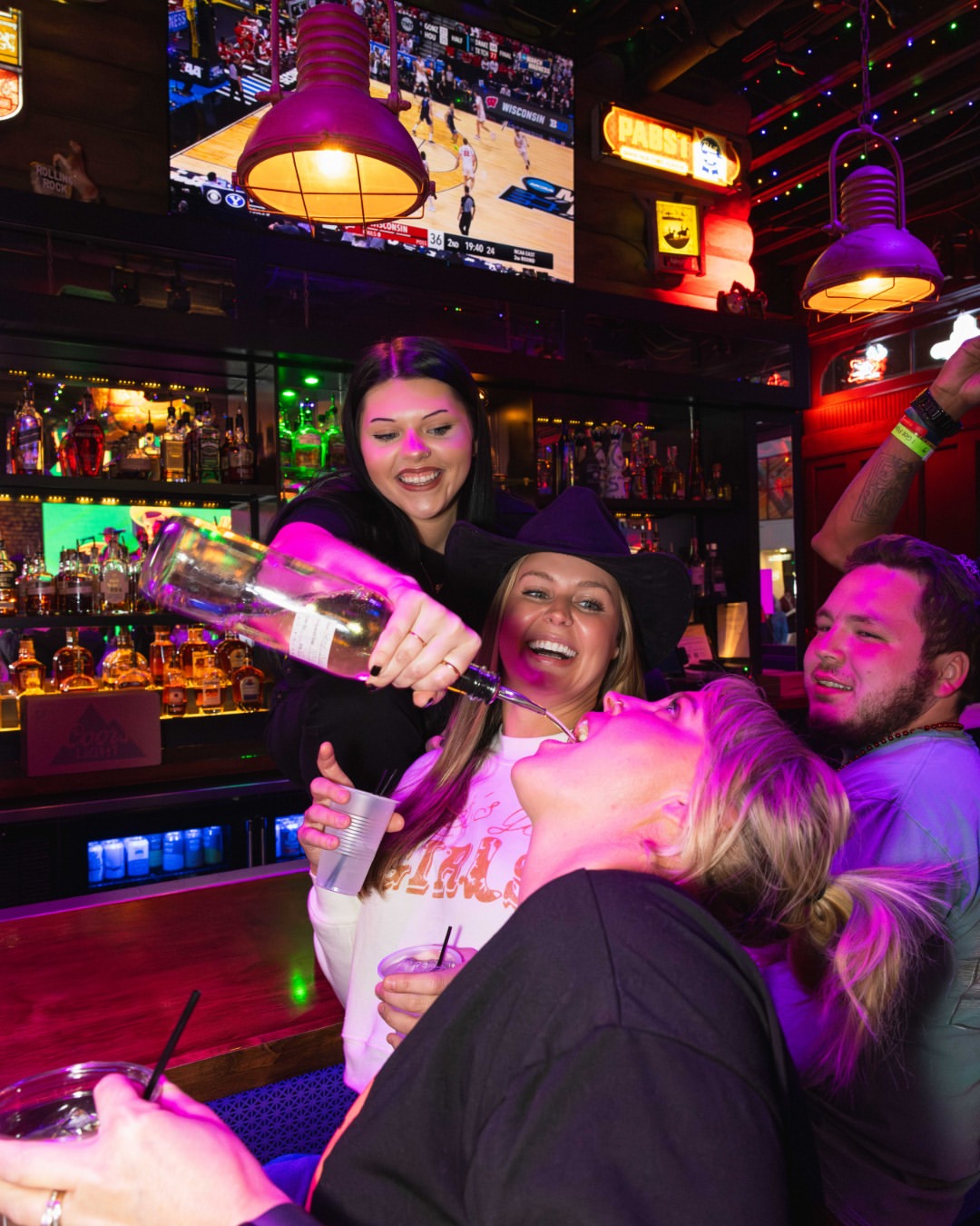 Chic and rustic interior setup of Show Pony Nashville featuring stylish furniture and lighting.