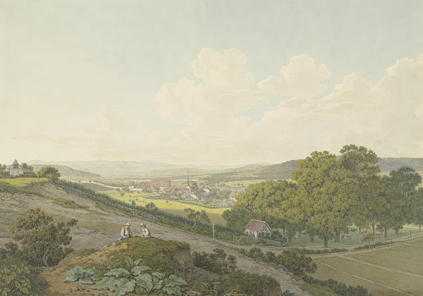 Blick von einer Anhöhe auf das Dorf St Jakob bei Basel mit spitzem Kirchturm 180