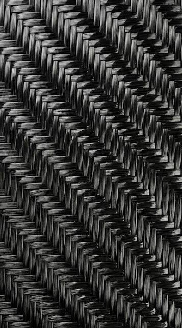 Ultra-Realistic Carbon Fiber Weave with Glossy Finish - Free mobile Wallpaper