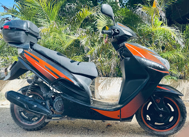 Orange scooter Tulum