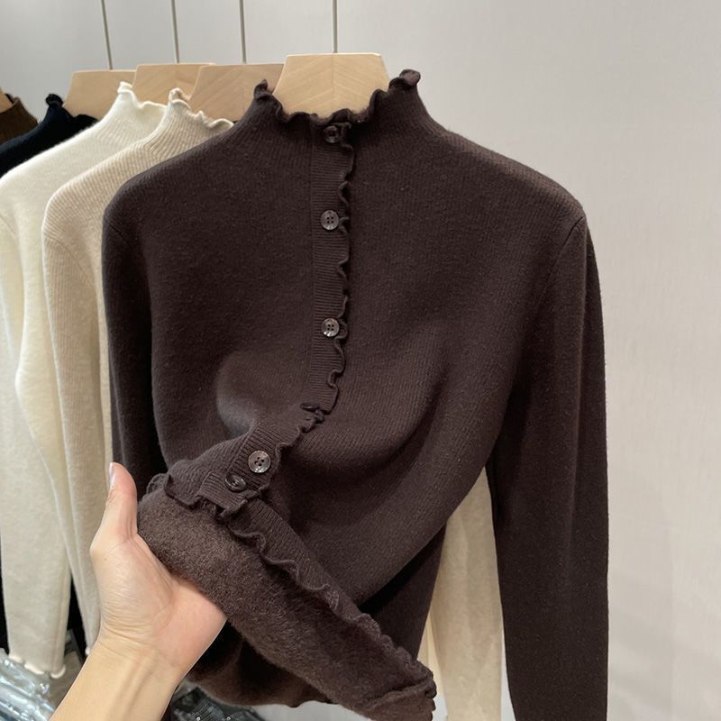 Women's sweater with stand-up collar and wave hem