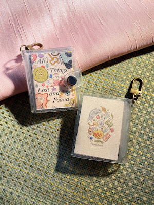 All Things Lost and Found Mini Book Keychain