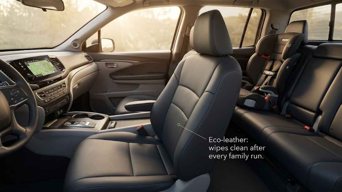 Honda Ridgeline in-bed trunk shown open with seal inspection notes for waterproof cargo storage and used buyer checks.