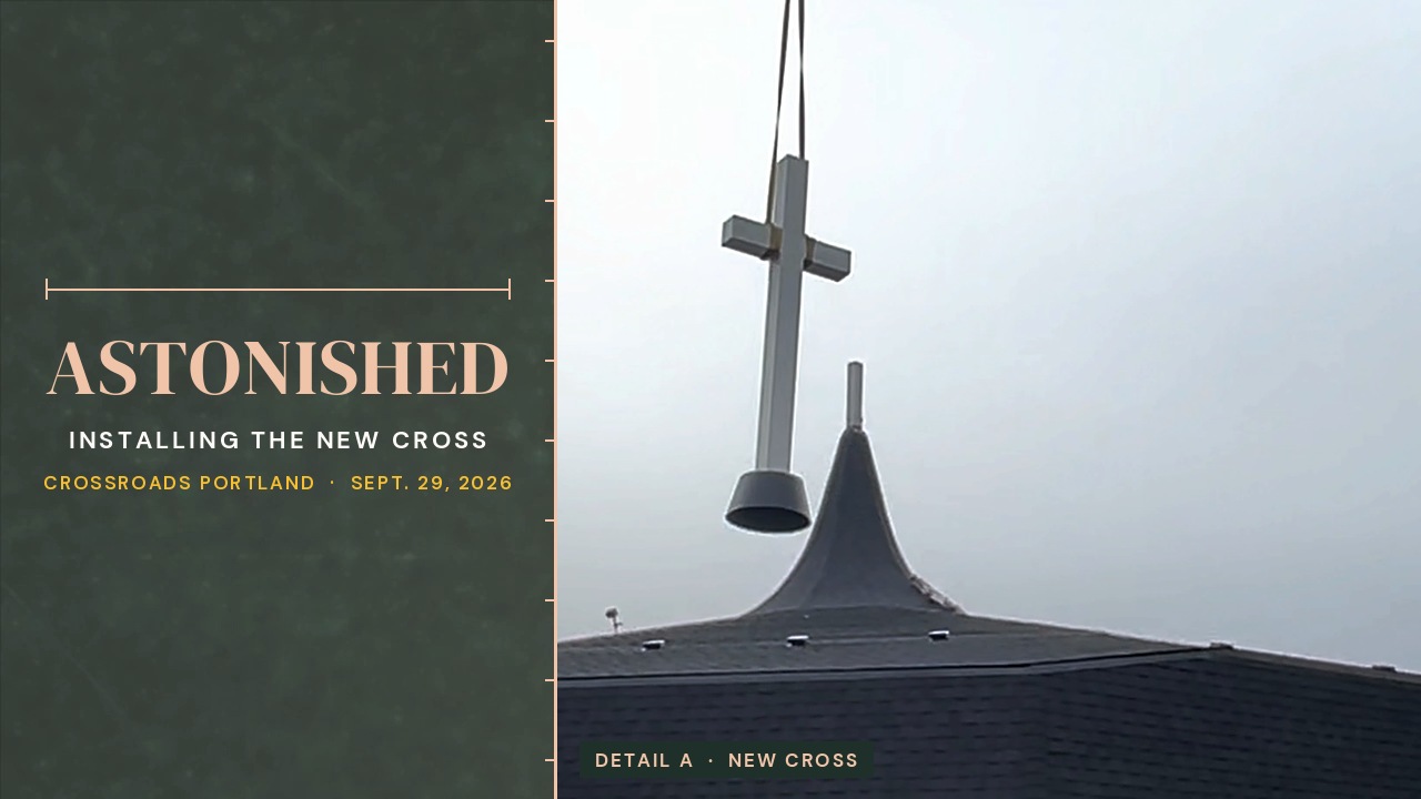 Astonished: Installing the New Cross, with the real new cross being lifted onto the Crossroads steeple.