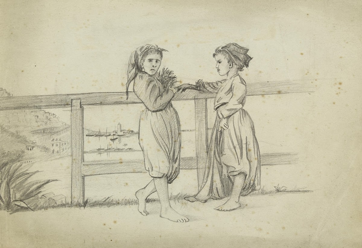 Deux fillettes devant une barrière de bois